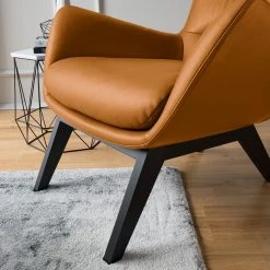 Fauteuil Hepburn I - Cuir véritable Neka en Cognac et Noir | Studio Copenhagen -Pas Cher Fauteuils Magasin 1000114828 180713 152046259 MOOD GALLERYIMAGES P000000001000114828 mood